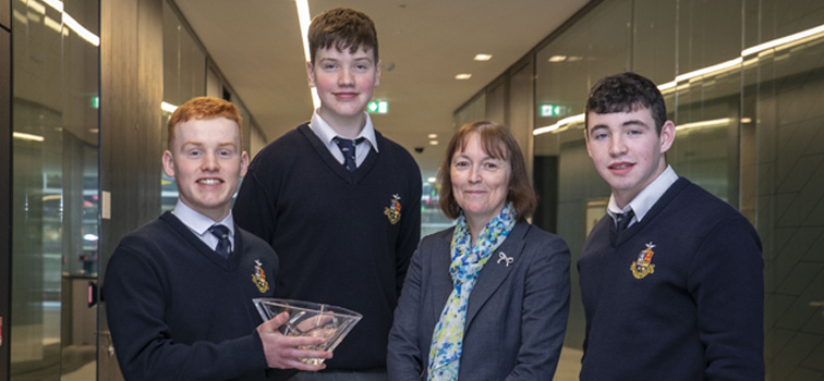 Generation Euro winners Peter Heaney, Padraig Duggan and Ronan O'Connor from Rockwell College with Deputy Governor Donnery