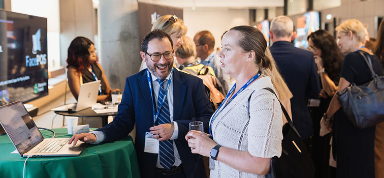 756x350-Image-4 Attendees of the Sandbox Programme Event at Central Bank of Ireland smiling and talking to each other