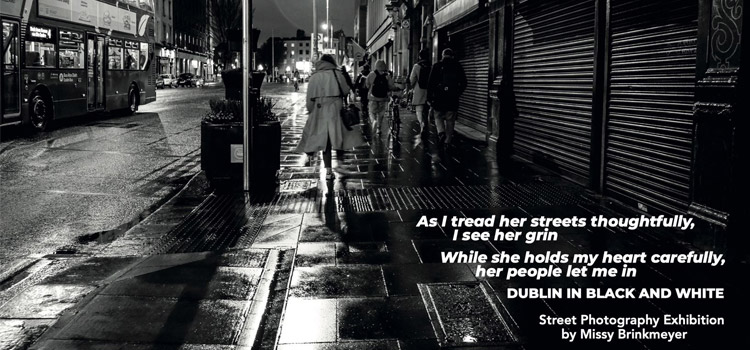 Woman walking on a dark wet street