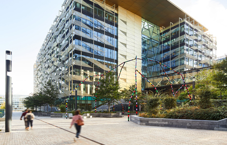 People walking on pathway at Central Bank of Ireland building