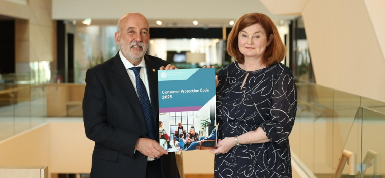 Governor Gabriel Makhlouf with Deputy Governor Derville Rowland holding a copy of the 2025 Consumer Protection Code